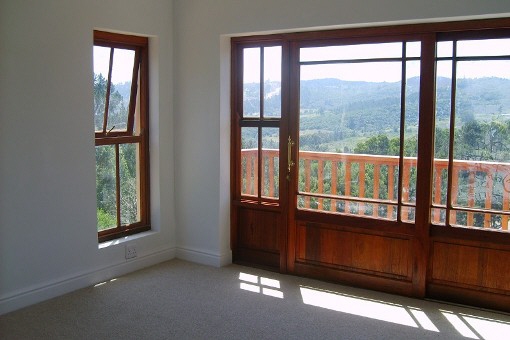 Room with wooden windows