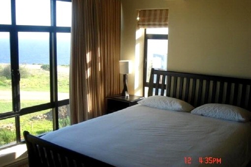 Bedroom with ocean view