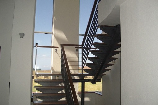 Staircase with large windows