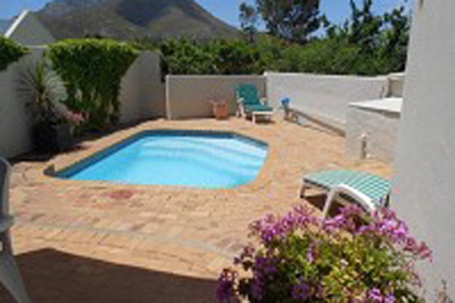 Enjoy family life in this cozy property with fynbos garden and pool in South Africa